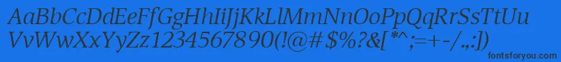 DevinItalic Font – Black Fonts on Blue Background