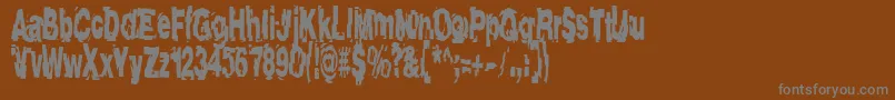 フォントAftershock – 茶色の背景に灰色の文字