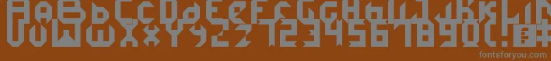 IceDemon-fontti – harmaat kirjasimet ruskealla taustalla