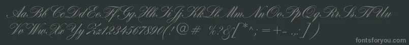 Hogarthscriptc-fontti – harmaat kirjasimet mustalla taustalla