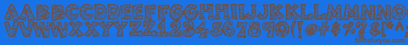 Kb3spiderpatch Font – Brown Fonts on Blue Background
