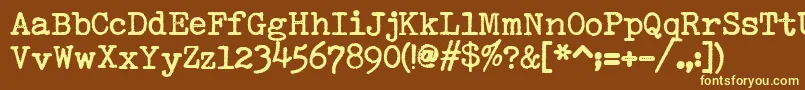 SmithyxtHeavyV22-fontti – keltaiset fontit ruskealla taustalla