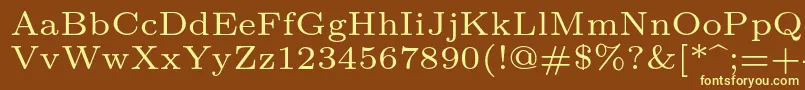 Lmroman6Regular-fontti – keltaiset fontit ruskealla taustalla