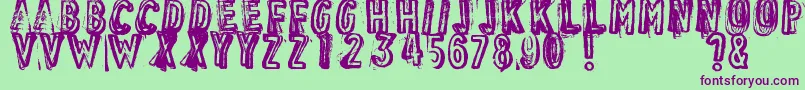 VintageFindDistressed Font – Purple Fonts on Green Background