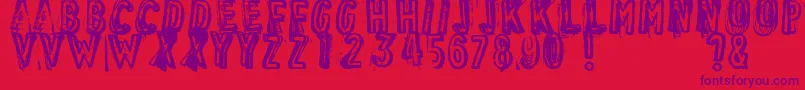 VintageFindDistressed Font – Purple Fonts on Red Background