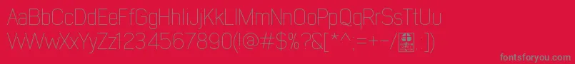EarlyTimesThinDemo-Schriftart – Graue Schriften auf rotem Hintergrund