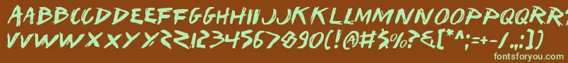 フォントIwantv2 – 緑色の文字が茶色の背景にあります。