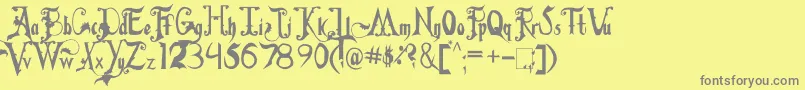 FiddumsFamily-Schriftart – Graue Schriften auf gelbem Hintergrund