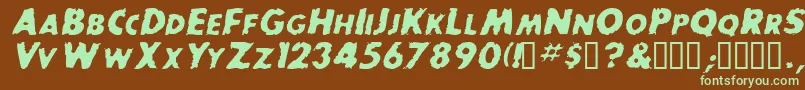 BaddogscapssskItalic Font – Green Fonts on Brown Background