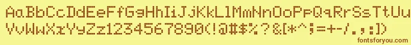 フォントScreenmatrix – 茶色の文字が黄色の背景にあります。