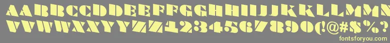 ABraggatitulspdn Font – Yellow Fonts on Gray Background