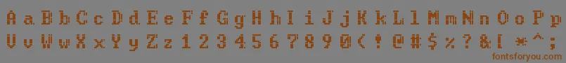 フォントCode – 茶色の文字が灰色の背景にあります。