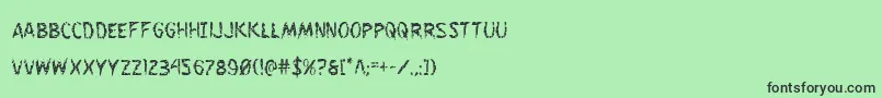 Flesheatingcond Font – Black Fonts on Green Background
