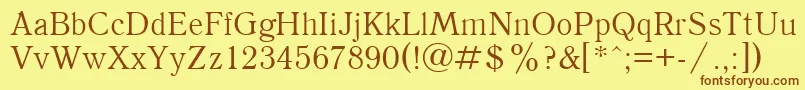 UkAntique Font – Brown Fonts on Yellow Background