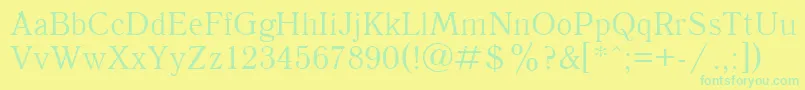 UkAntique Font – Green Fonts on Yellow Background
