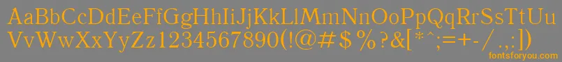 UkAntique Font – Orange Fonts on Gray Background