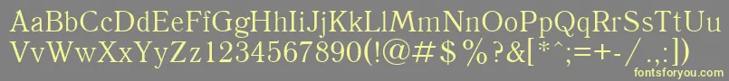 UkAntique Font – Yellow Fonts on Gray Background