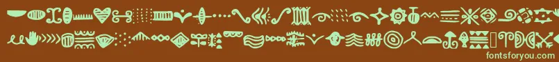 Doodlizing-Schriftart – Grüne Schriften auf braunem Hintergrund