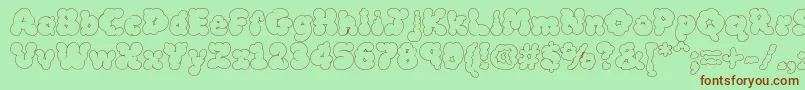 Mcklw Font – Brown Fonts on Green Background