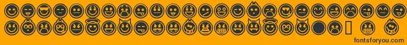 Czcionka EmoticonsOutline – czarne czcionki na pomarańczowym tle