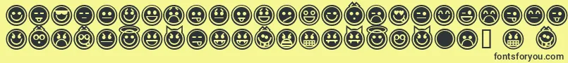 Czcionka EmoticonsOutline – czarne czcionki na żółtym tle