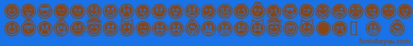 Czcionka EmoticonsOutline – brązowe czcionki na niebieskim tle