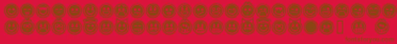 Czcionka EmoticonsOutline – brązowe czcionki na czerwonym tle