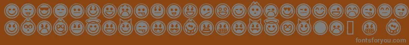 EmoticonsOutline Font – Gray Fonts on Brown Background