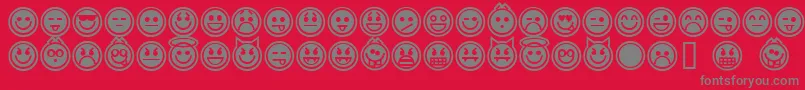 Шрифт EmoticonsOutline – серые шрифты на красном фоне