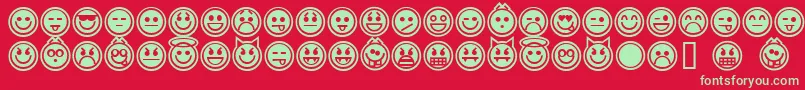 Czcionka EmoticonsOutline – zielone czcionki na czerwonym tle