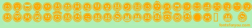 Czcionka EmoticonsOutline – pomarańczowe czcionki na zielonym tle