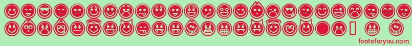 Czcionka EmoticonsOutline – czerwone czcionki na zielonym tle
