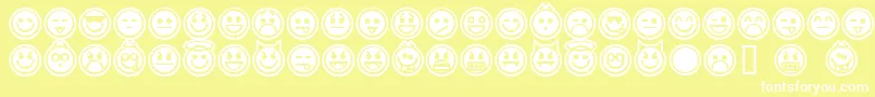 Czcionka EmoticonsOutline – białe czcionki na żółtym tle