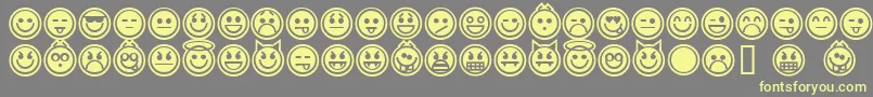 フォントEmoticonsOutline – 黄色のフォント、灰色の背景