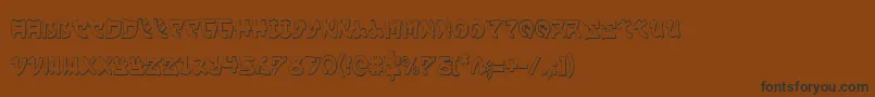 フォントYamaMotoCondensed3D – 黒い文字が茶色の背景にあります