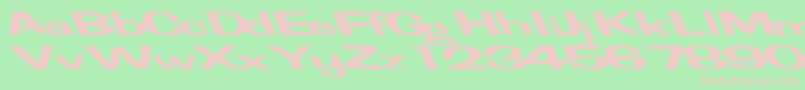 フォントFertilemindplusRegularTtext – 緑の背景にピンクのフォント