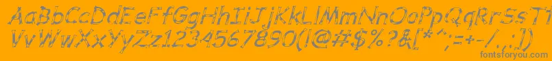 DalmataDreamItalic-fontti – harmaat kirjasimet oranssilla taustalla