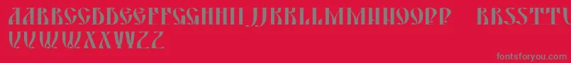 フォントYermak – 赤い背景に灰色の文字