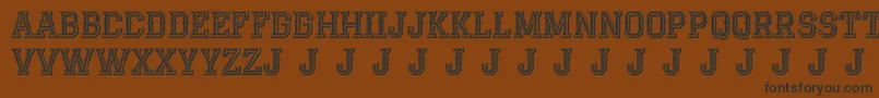 AlterdecoJackrunner Font – Black Fonts on Brown Background