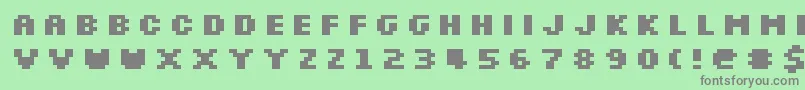 Czcionka SilkscreenExpandedBold – szare czcionki na zielonym tle