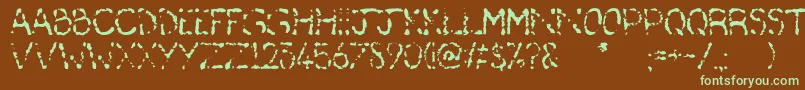 フォントDeafas – 緑色の文字が茶色の背景にあります。