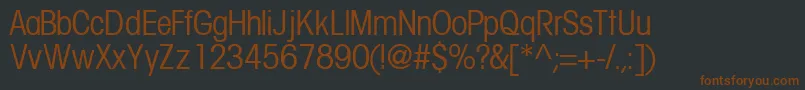 Шрифт TrendexcondsskRegular – коричневые шрифты на чёрном фоне