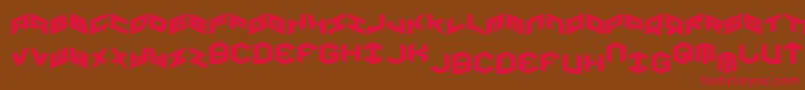 フォントYayusaexpand – 赤い文字が茶色の背景にあります。