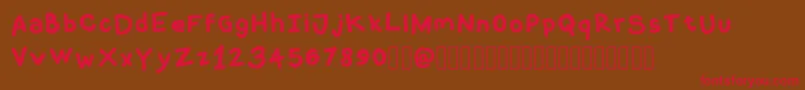 CoquerliRegular Font – Red Fonts on Brown Background