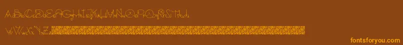 Czcionka Blacksmith – pomarańczowe czcionki na brązowym tle