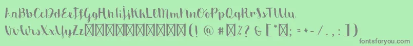 EmilyTheBrush Font – Gray Fonts on Green Background