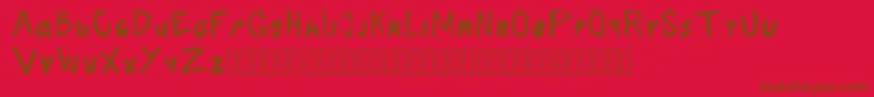 Boludos-fontti – ruskeat fontit punaisella taustalla