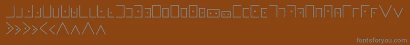 フォントMasonicwriting – 茶色の背景に灰色の文字