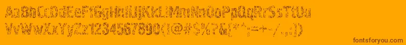 Pollockc4-Schriftart – Braune Schriften auf orangefarbenem Hintergrund