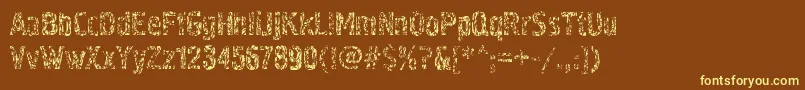 Pollockc4-fontti – keltaiset fontit ruskealla taustalla